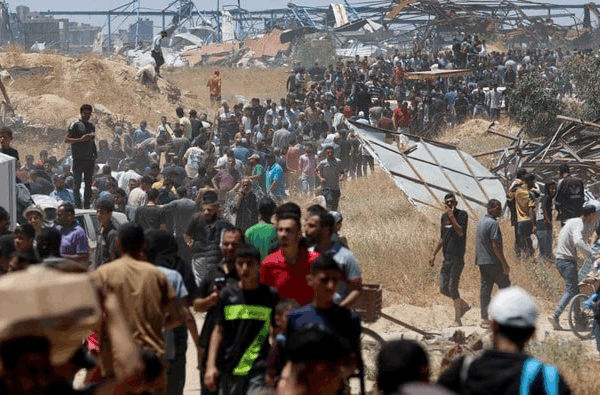 Israel Opens Fire on Gaza Crowd Waiting for Food Aid, 59 Dead Israel Opens Fire on Gaza Crowd Waiting for Food Aid, 59 Dead